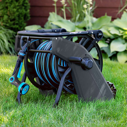 Chariot-dévidoir avec manche pliable