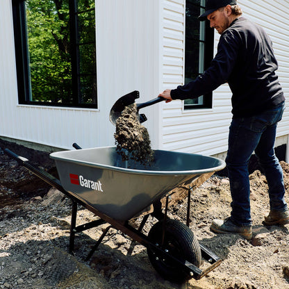 Pelle ronde avec poignée en D