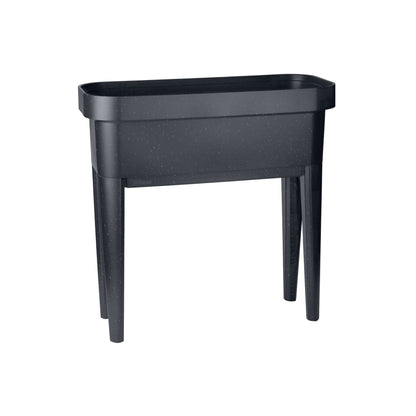 Raised garden bed with trellis and self-watering system