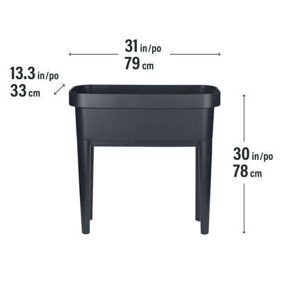 Raised garden bed with trellis and self-watering system