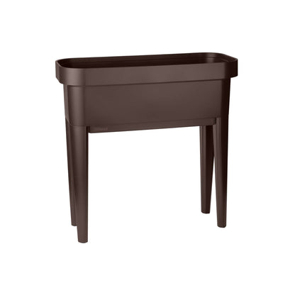 Raised garden bed with trellis and self-watering system