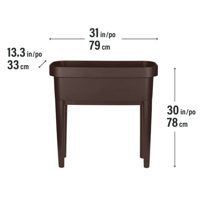 Raised garden bed with trellis and self-watering system